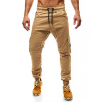 Брюки на резинке с карманами песочные