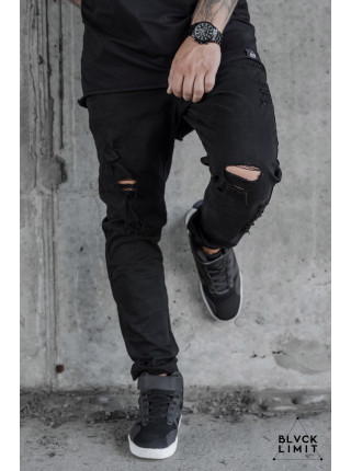 Джинсы рваные